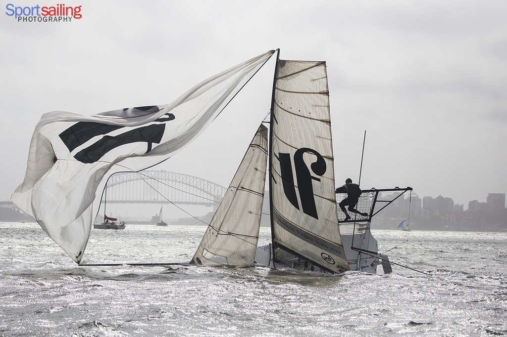 Thurlow Fisher Lawyers had a spectacular capsize by Shark Island  - 18ft Skiff JJ Giltinan Championships2013 - Race 7 © Beth Morley - Sport Sailing Photography http://www.sportsailingphotography.com